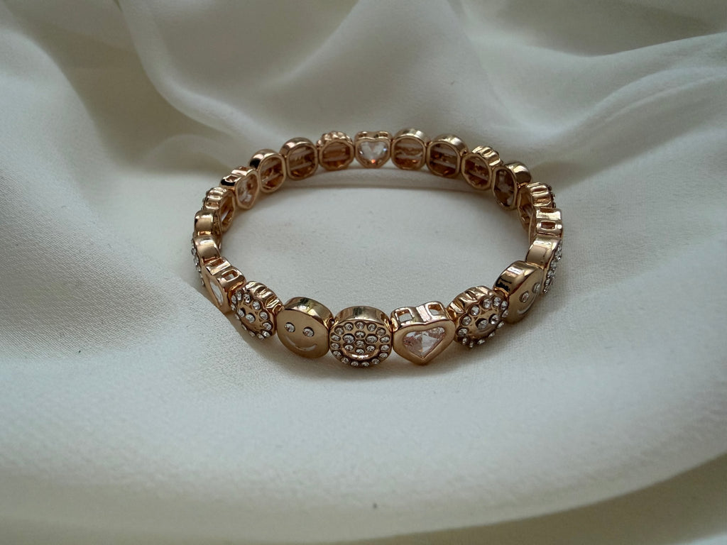 Smiley face and heart bracelet - Reen & co.Smiley face and heart bracelet