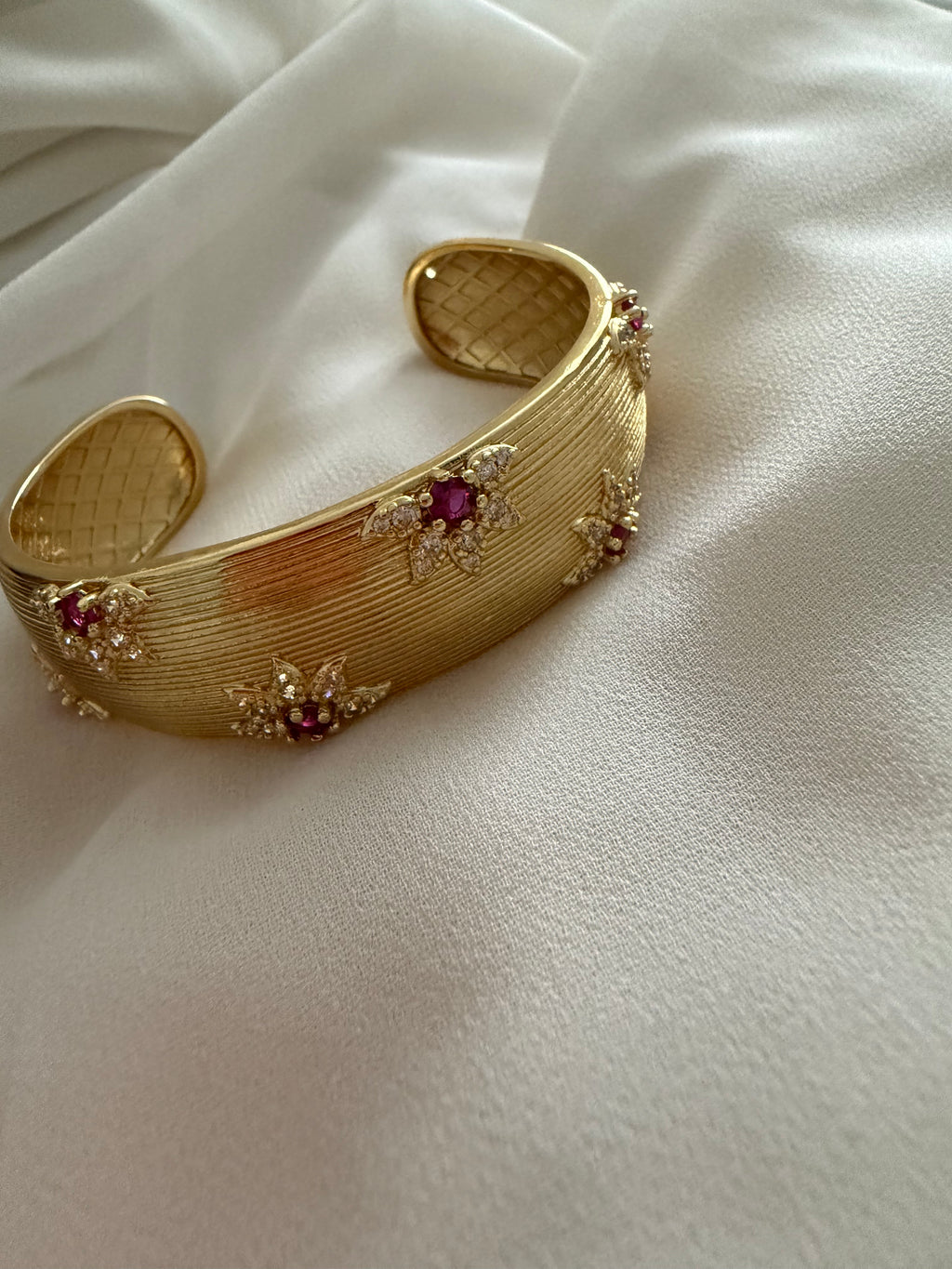 Flower encrusted open bangle cuff