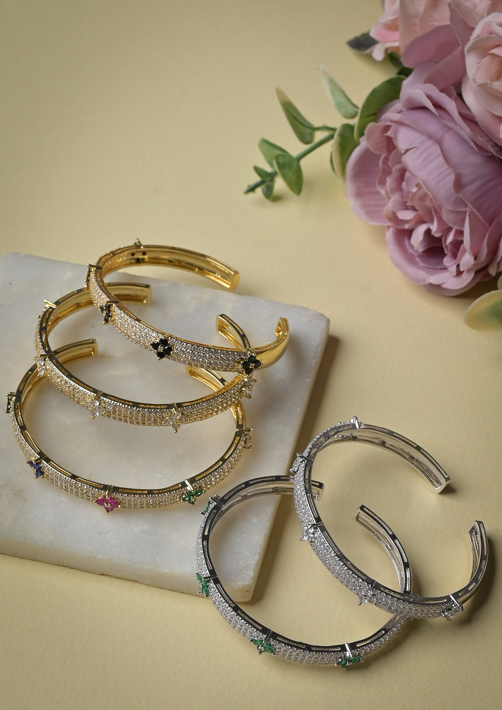 Zircon encrusted flower bangles