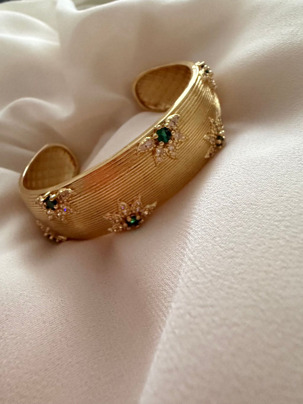 Flower encrusted open bangle cuff