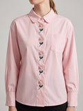Rose pearl button top - Reen & co.Rose pearl button top
